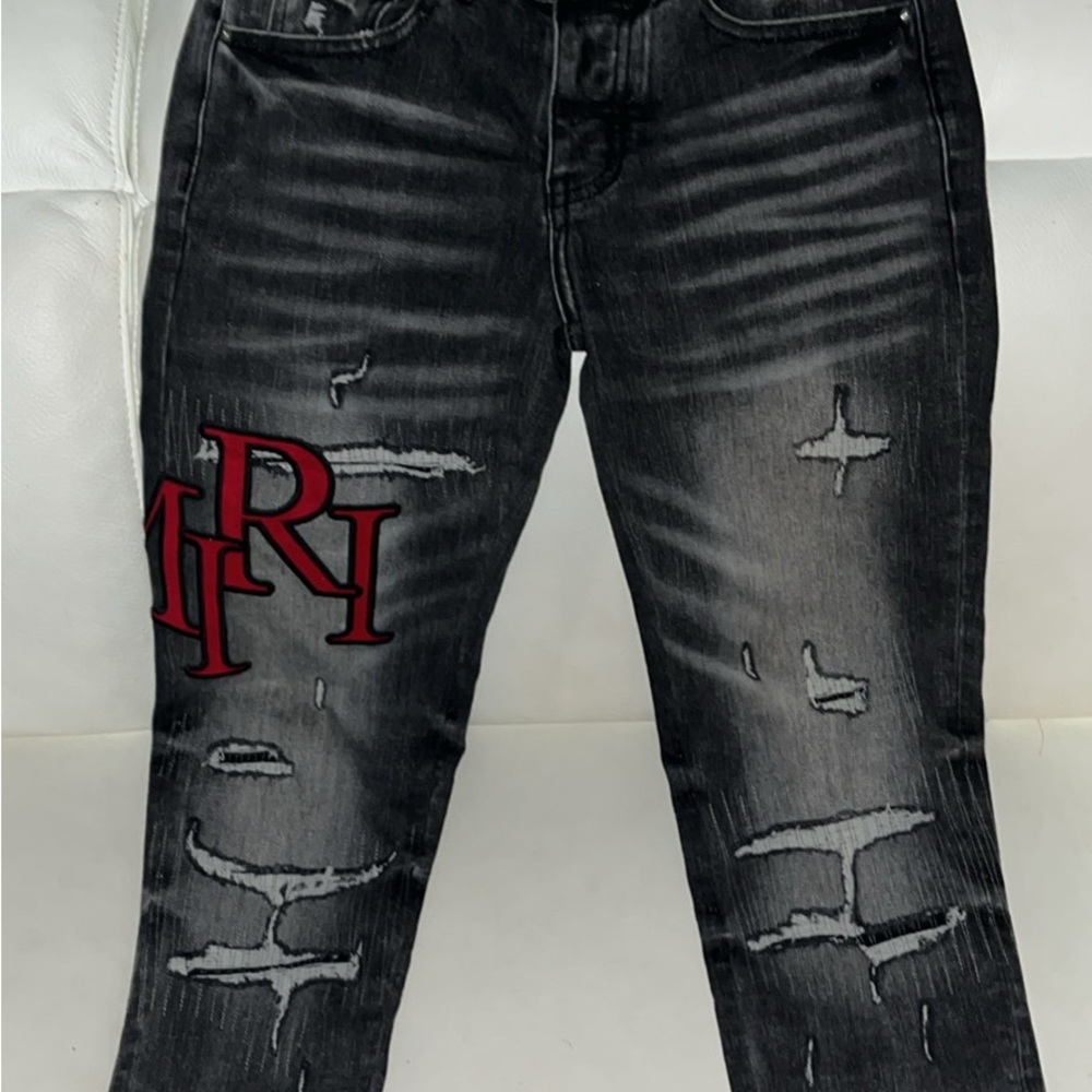AMIRI Black Distressed Jeans with Red Accents